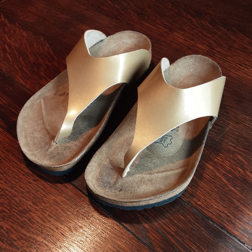 Birkis in gold leather.